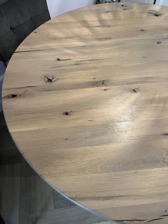 Image 1 of Round oak wooden dining table with industrial steel legs