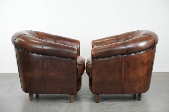 Image 1 of 2 poltrone da club in pelle di pecora con cuscino di seduta fisso e bellissimi colori