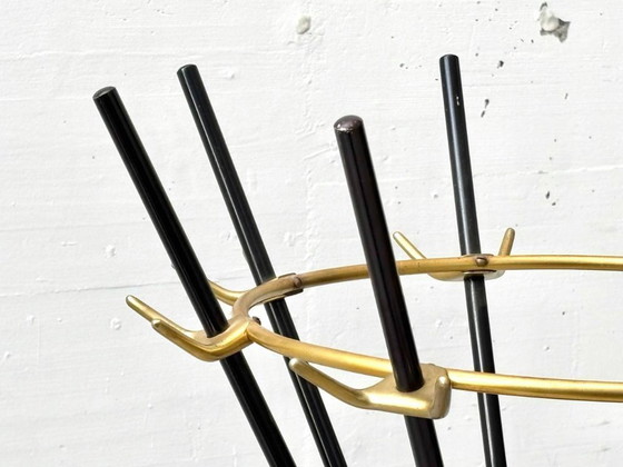 Image 1 of Armoire pivotante italienne avec éléments en laiton, Italie des années 1950