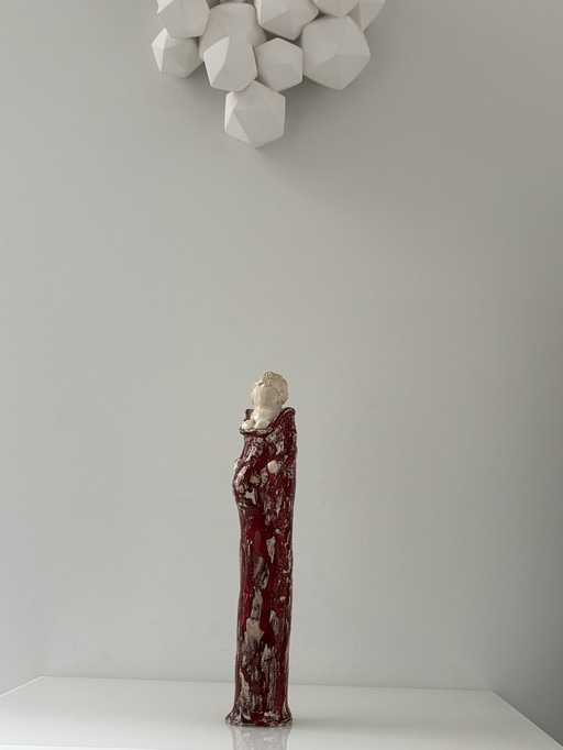 Ceramic statue of a pregnant woman