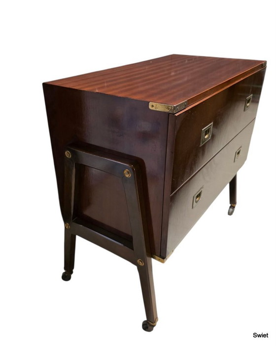 Image 1 of 2294 Vintage wooden cabinet with brass details and wheels