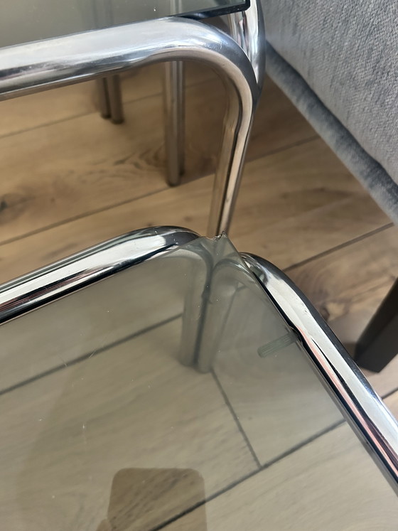 Image 1 of Ensemble de tables vintage milieu du siècle, structure en acier inoxydable et verre foncé