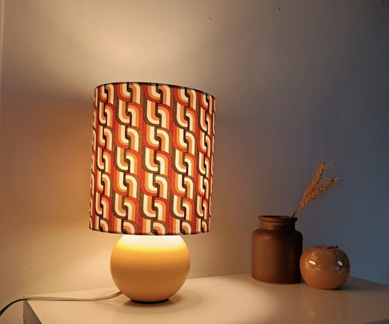 Image 1 of vintage lamp with green/yellow graphic print, seventies