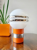 Vintage table lamp with orange wooden base and glass ball shade from the 1960s