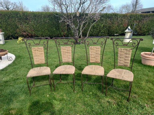 Set aus 4 schmiedeeisernen Stühlen mit Sitzflächen und Rückenlehnen aus geflochtenem Seil