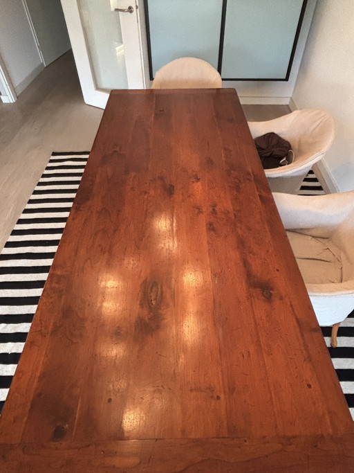 table à manger en bois de cerisier