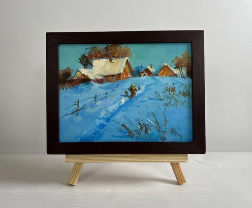 Origineel olieverfschilderij: Winterdorpslandschap met een besneeuwd pad in het dorp.