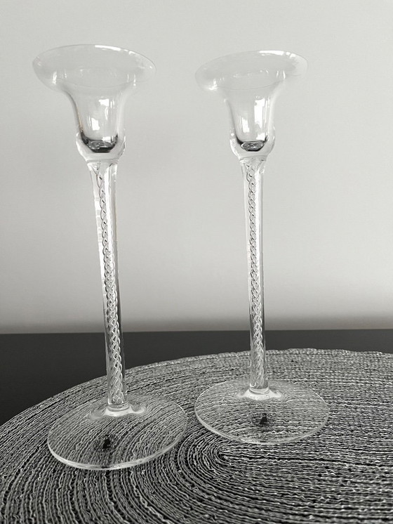 Image 1 of Set di due candelieri soffiati a bocca con meccanismo ad aria.