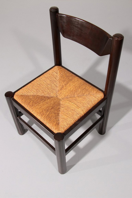 Image 1 of Essgruppe, inspiriert von Vico Magistretti, bestehend aus sechs elegant neu geflochtenen Stühlen und einem Tisch.