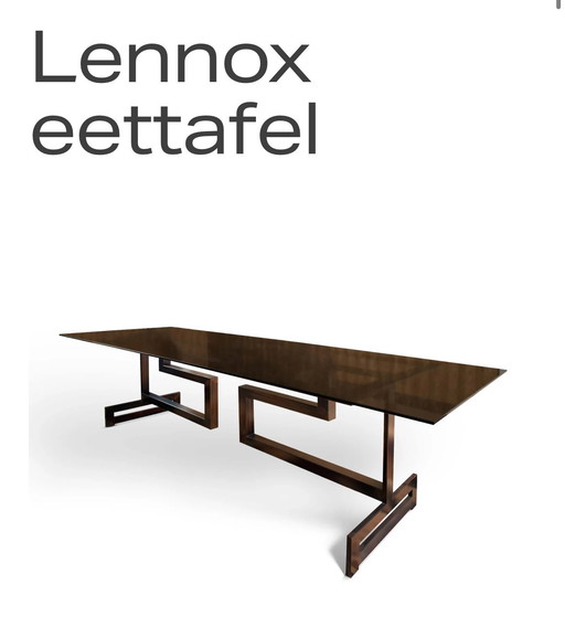 Glass table with designer base | Rapture Interior