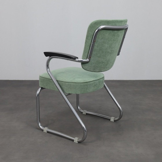 Image 1 of Een paar buisvormige stalen fauteuils van Paul Schuitema voor Fana Metaal, Nederland, jaren 1950.