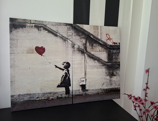 2 Panneaux Toile avec Impression Iconique de Banksy.