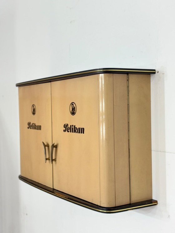 Image 1 of Beautiful vintage Pelikan wall cabinet, wall cupboard, hanging display cabinet, mid-century modern