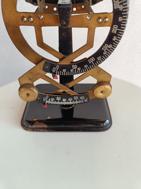 Image 1 of Escala de letras holandesa antigua “bilateral”, latón y esmalte, años 40-50.