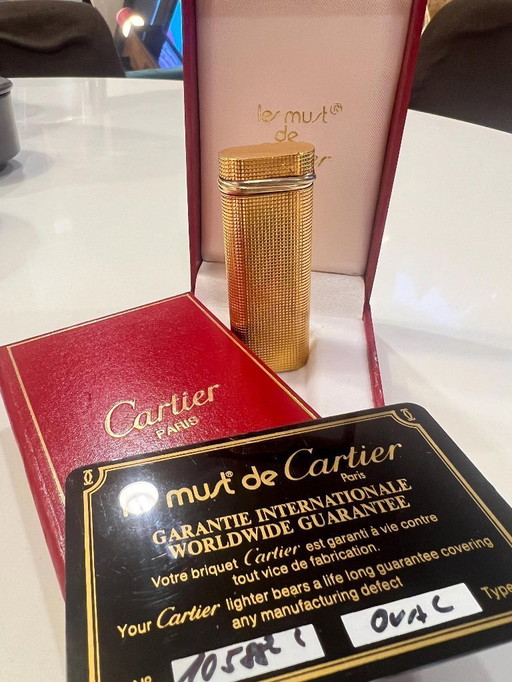 Original vintage Cartier Lighter gold-plated with Trinity ring made in 1983 with certificate, original box and case