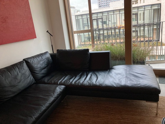 Image 1 of Divano in pelle nera con chaise longue B&B Italia