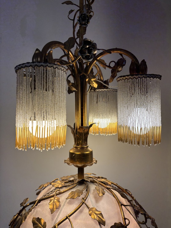 Image 1 of Exclusive chandelier with brass leaves and silver-colored roses