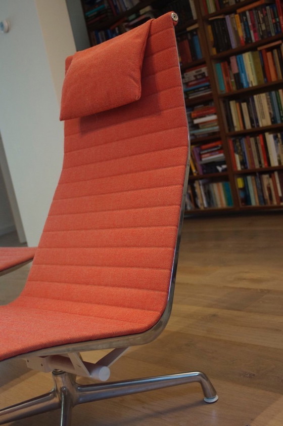 Image 1 of Eames aluminum Lounge chair with footstool coral red as new