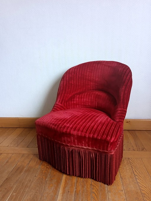 Rode fluwelen paddenstoelfauteuil met franjes