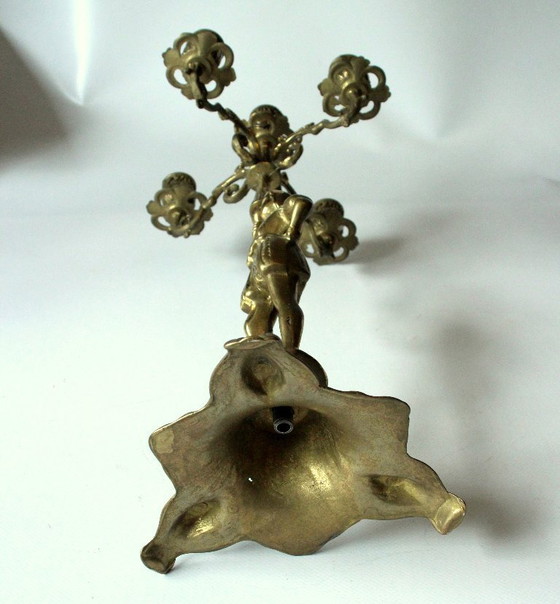 Image 1 of 2 heavy candelabra/candlestick brass with 5 arms as a set