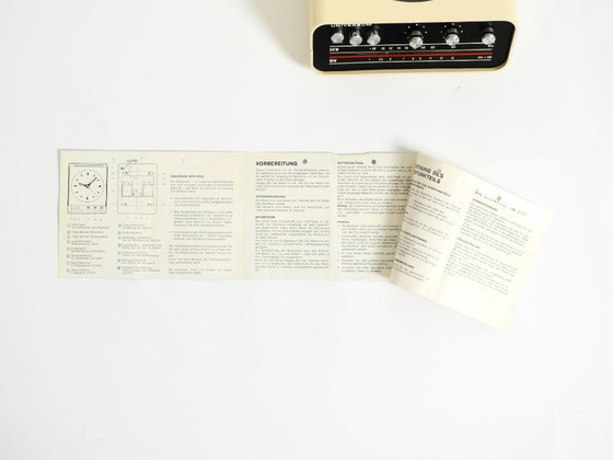 Image 1 of Original 1970s UNIVERSUM Wall Clock with Radio by Adriano Rampoldi for Quelle Versand Germany – Made in Italy