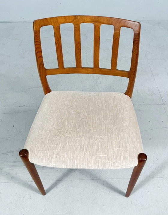Image 1 of JL Møllers, ensemble de 4 chaises de salle à manger, modèle '83', teck, laine, années 1960, Danemark (4)