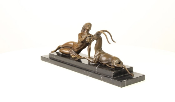 Image 1 of BRONZE STATUE OF AN AMAZON WITH ANTILOPE
