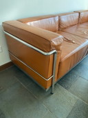 Leather three-seater sofa with ambassador