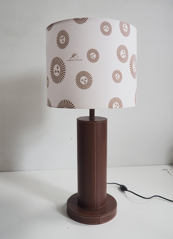 Image 1 of  Leder-Tischlampe/ Schatten Fornasetti-Stoff