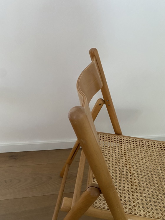 Lot de 2 chaises Habitat vintage - Chaises pliantes - Bois de hêtre et sangles en rotin - Années 70/80 (photo 6 of 13)
