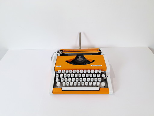 Vintage typemachine oranje UNIS TBM De Luxe