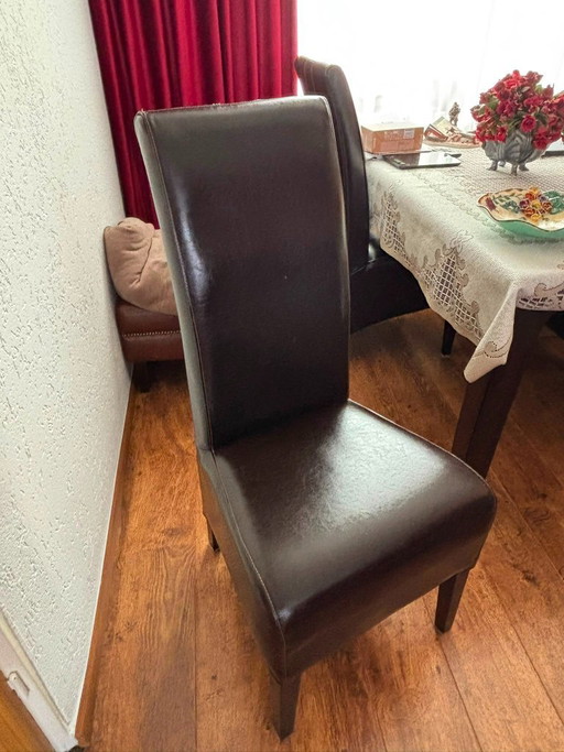 Set of four Dining chairs, dark brown leather