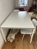 Ahrend table and two Revolt chairs