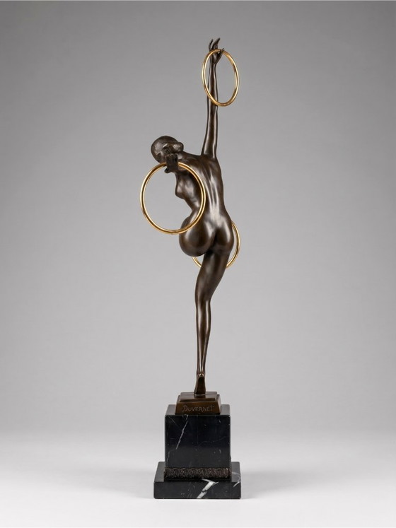 Image 1 of Art Deco sculpture of a dancer with rings in patinated bronze on a black marble-effect base – signed Duvernet – 58 cm