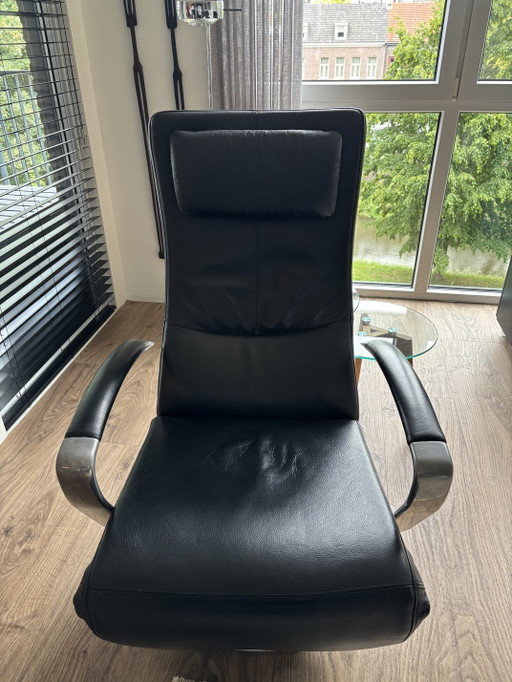 Te koop mooie zwartleren relaxstoel oplaadbaar