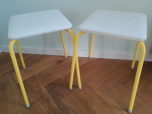 Set of 2 50s-60s tubular frame faux leather stools in white and yellow