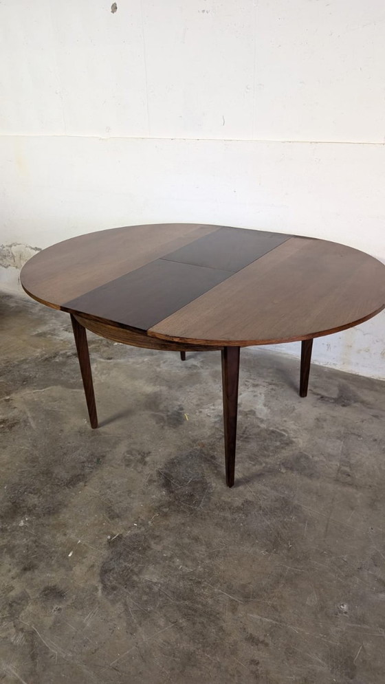 Image 1 of Vintage extendable dining table - round model in teak veneer- mid - Century