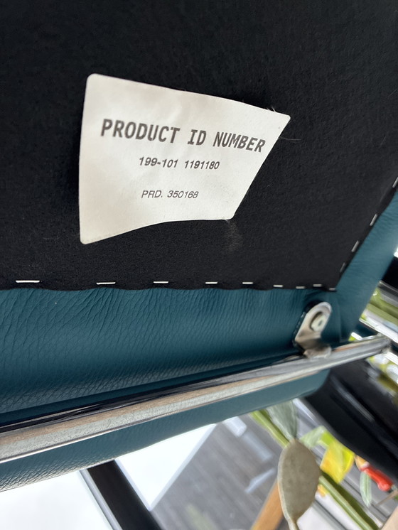 Image 1 of Leolux Talassa Fauteuil Senseo leather 3040 and spruzza armchair.