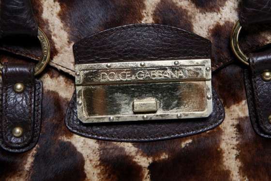 Image 1 of Dolce & Gabbana, Borsa a mano in pelle marrone con stampa giraffa in pelo di vitello.