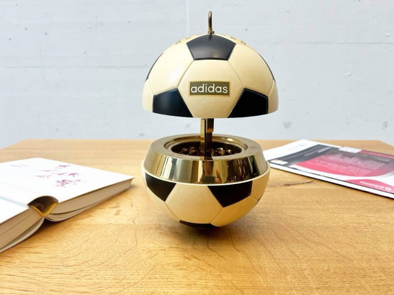 Image 1 of Vintage Adidas cigarette dispenser from the 1970s