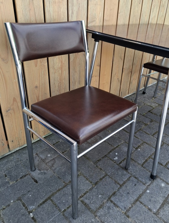 Image 1 of Vintage kitchen table with 2 chairs. 1960s