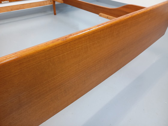 Image 1 of Scandinavian-style vintage double bed in teak by designers Tricoire and Vecchione for the "Meubles TV Paris" brand in the 1960s.