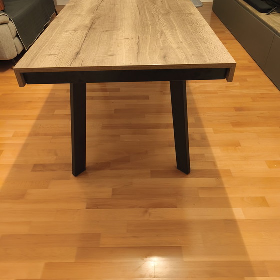 Image 1 of Favignana industrial-style extendable table in metal and wood