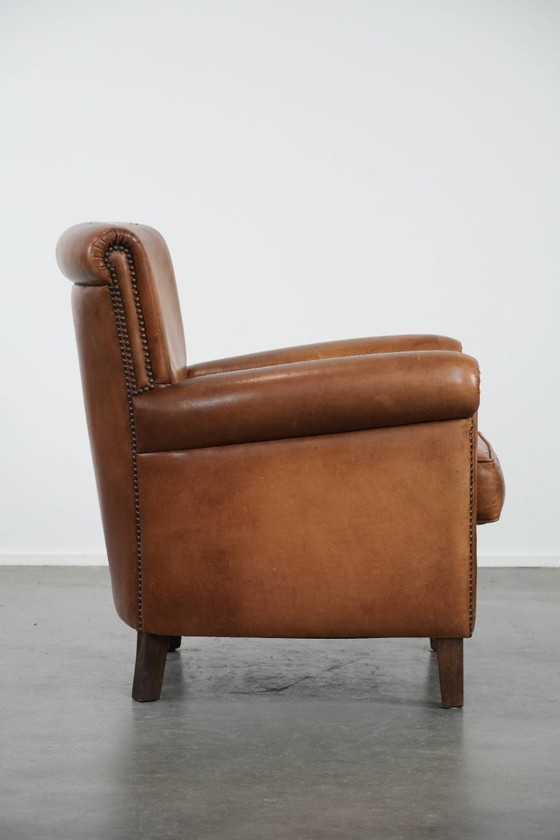 Image 1 of Vintage schapenleren fauteuil/ armchair met prachtige en warme kleuren