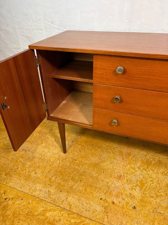 Image 1 of Mid Century Retro Teak Small Sideboard by Schreiber (Circa 1960)  A stylish and compact mid century modern teak sideboard by Sch