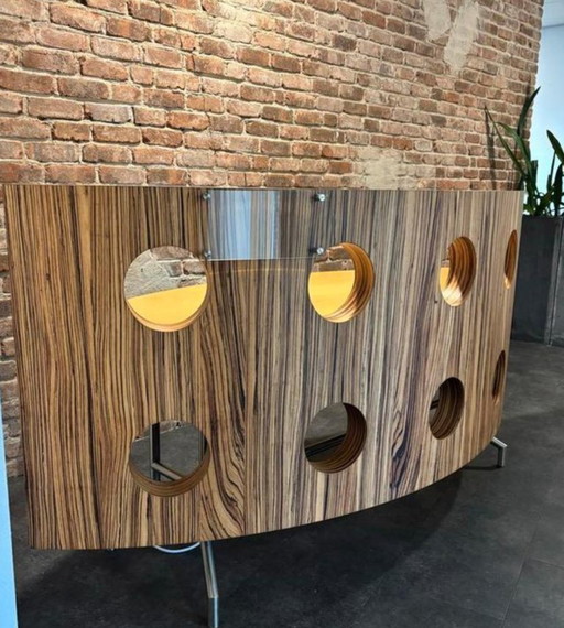 Bureau/comptoir d'accueil Ovaaeen en bois, au design moderne et élégant, avec piètement en acier inoxydable.