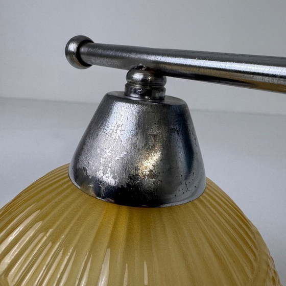 Image 1 of PAAR VINTAGE AMBERKLEURIGE WANDLAMPEN