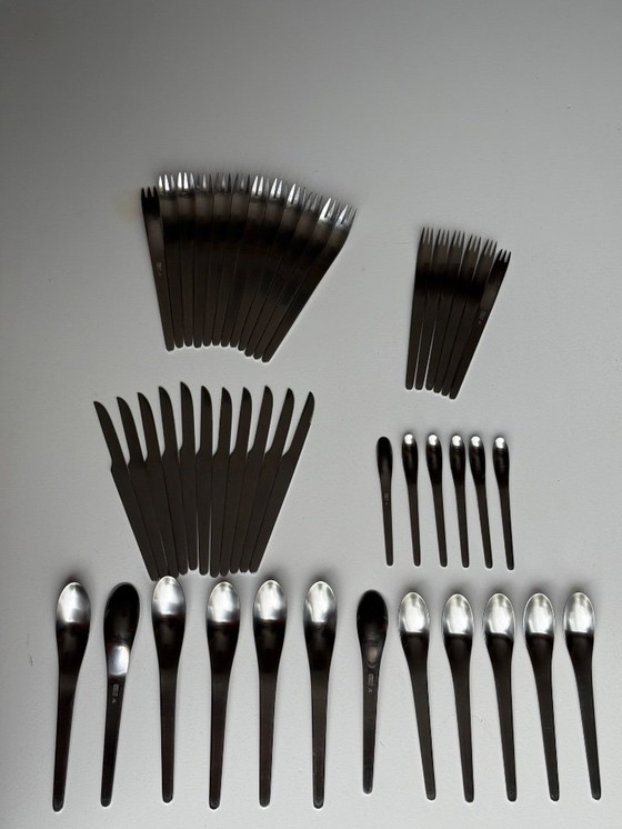 Image 1 of 48 Couverts Arne Jacobsen Service AJ pour Anton Michelsen - Design danois inox vintage années 50/60