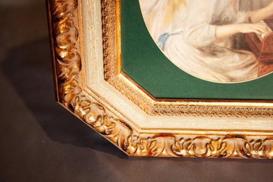 Image 1 of Panneau en bois sculpté orné d'une reproduction de Renoir. Cadre hexagonal.