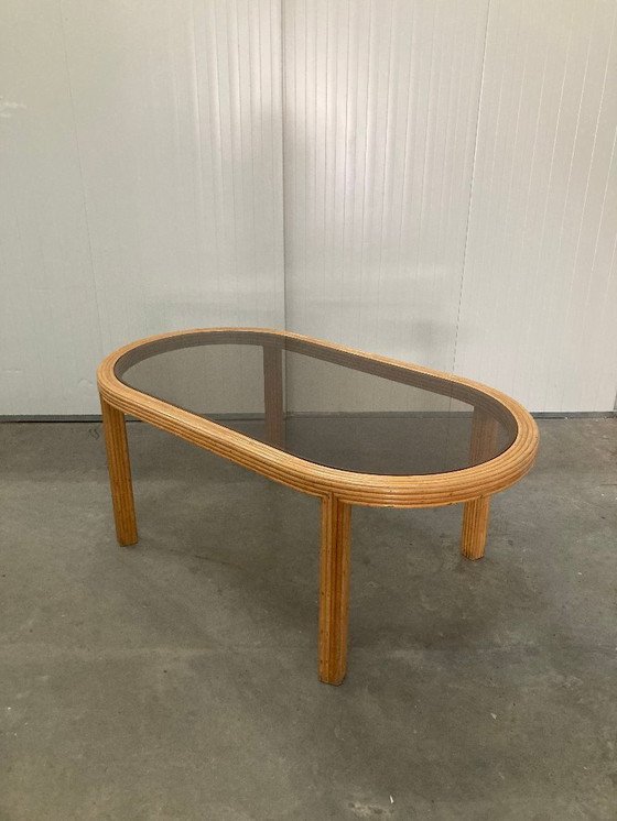 Image 1 of Table de salle à manger ovale en rotin et bambou avec plateau en verre fumé, 1970
